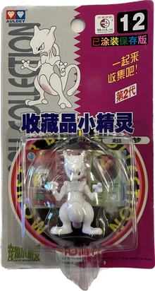 Pokémon Monster Collection Mewtwo #12 figure by TOMY, detailed plastic Pokémon toy on a display stand.