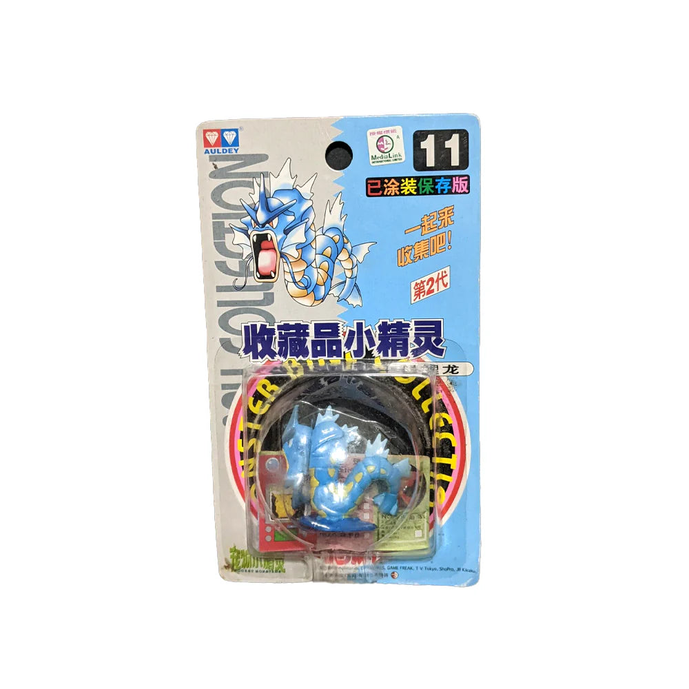 Pokemon Monster Collection Gyarados figure by TOMY, detailed toy with blue scales and fierce expression, part of Patrick’s Comics & Cards collection.